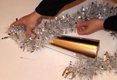 wrapping garland around trees